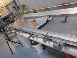 An arbor press  set up to make the a small bend required in the fabrication of a Cessna lower aileron skin