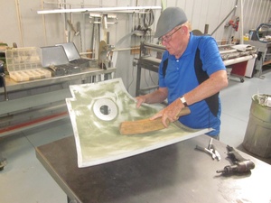 An arbor press  set up to make the a small bend required in the fabrication of a Cessna lower aileron skin